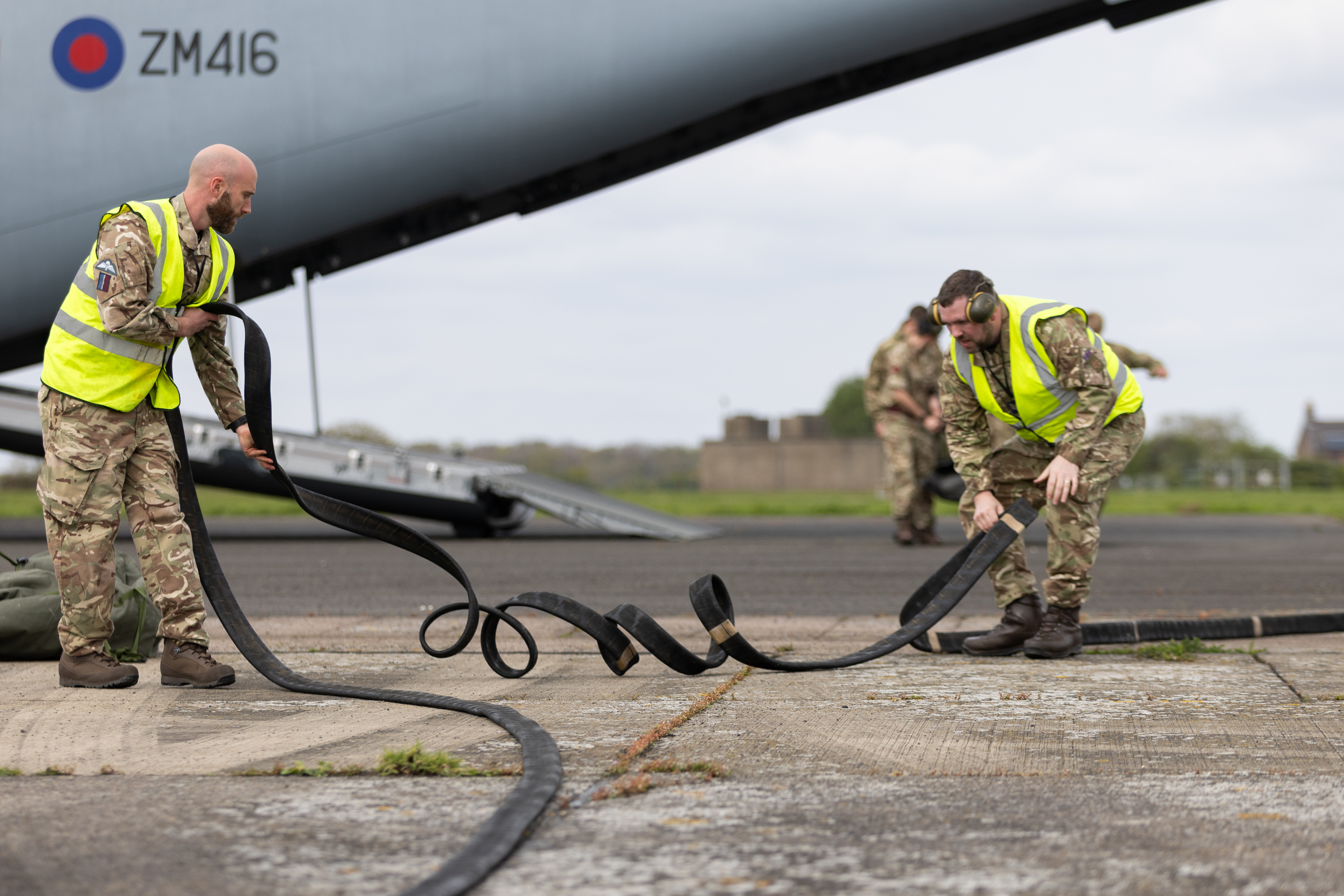 Photo: Fuels Support Team off-loading their Mobile Fueling Point and siphoning fuel from the Atlas C Mk.1 aircraft.
